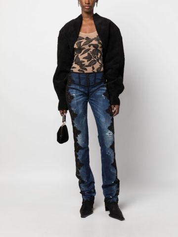 Blue skinny jeans with lace appliqué
