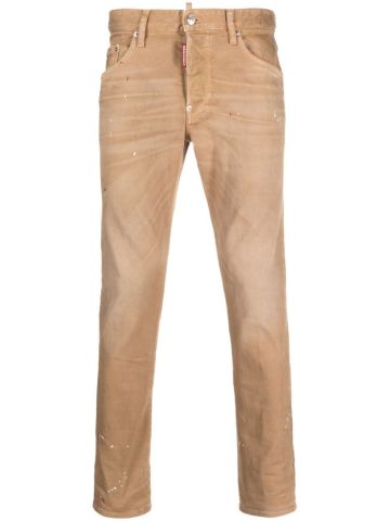 Beige skinny jeans with patent leather effect