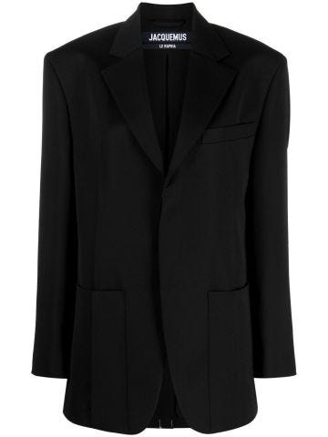 Black single-breasted blazer with lapels