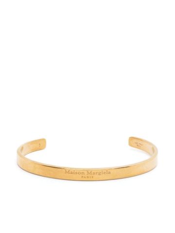 Gold rigid bracelet with engraved logo
