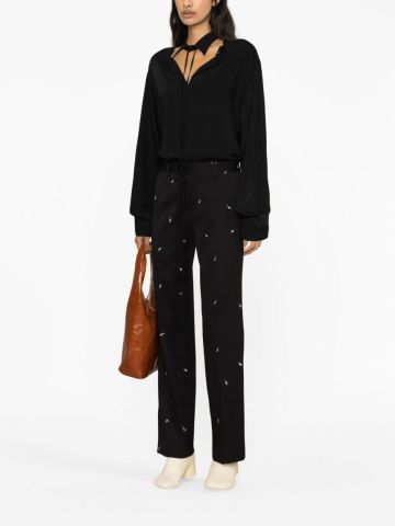 Black tailored trousers with patent leather effect