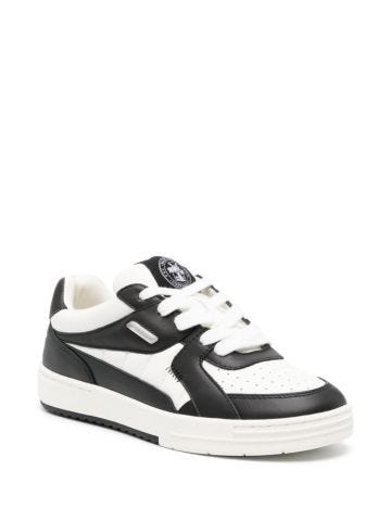 Black and white leather University trainers