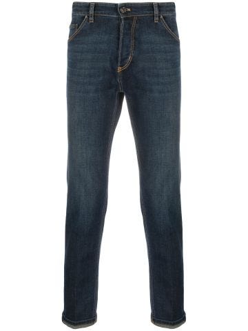 Low-rise stretch-cotton tapered jeans
