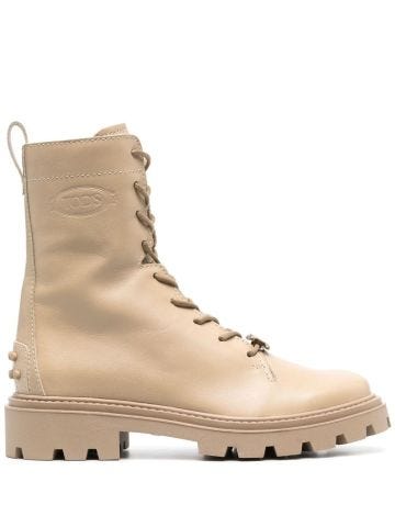 Beige ankle boots with logo plaque