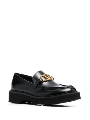 Black leather logo plaque loafers