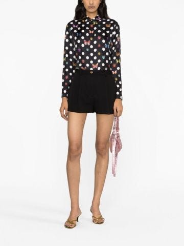 Black polka dot shirt with butterfly print