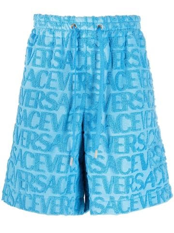 Light blue Bermuda shorts with embossed logo
