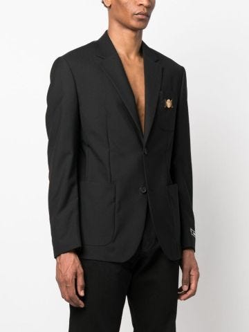 Black single-breasted blazer with logo plaque