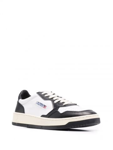 White and black Medalist low-top sneakers