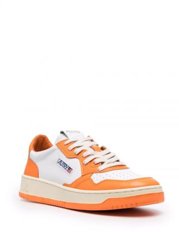 White and orange Medalist low-top sneakers