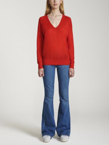 Red over V-neck and long sleeved Sweater
