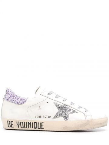 White Superstar Sneakers with purple contrasting detail