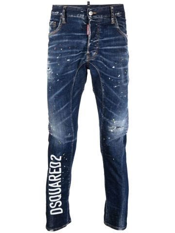 Blue tapered jeans with print