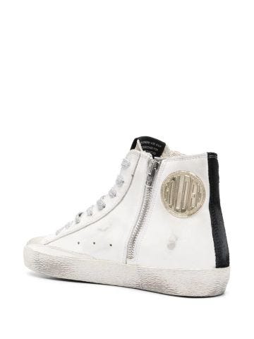 Leather high top sneakers with star patch