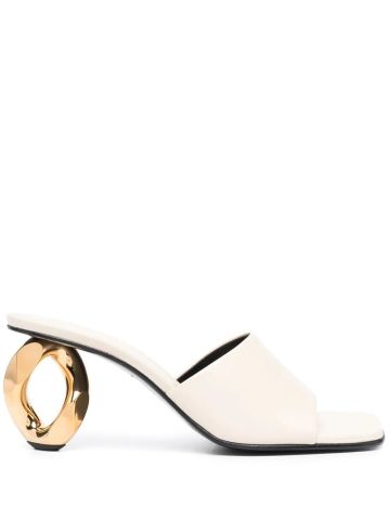 Ivory mules with gold sculpted heel