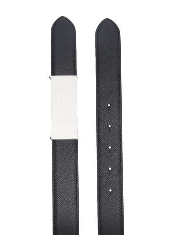 Black belt with silver logo plaque