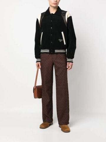 Brown trousers with jacquard pattern and overlays