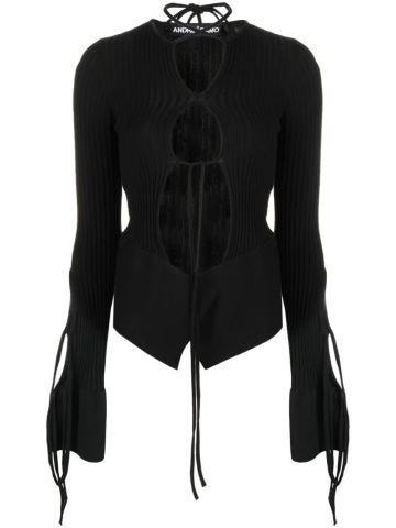 Black long-sleeved knit top with cut-out detail