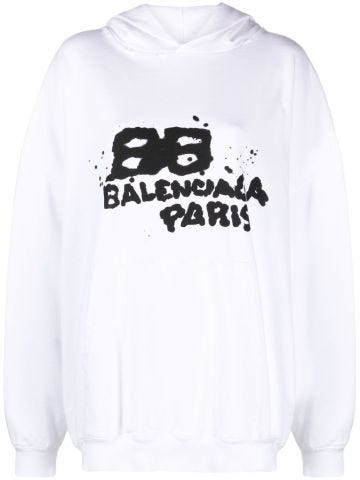 White sweatshirt with graffiti logo print