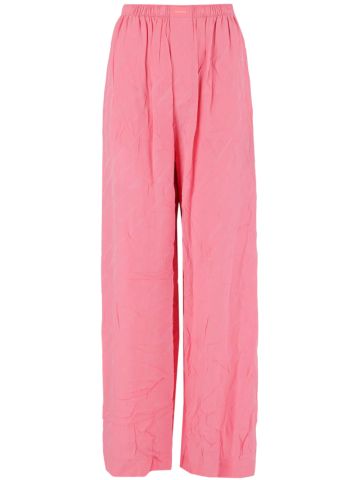 Pantaloni rosa in seta a gamba ampia con logo