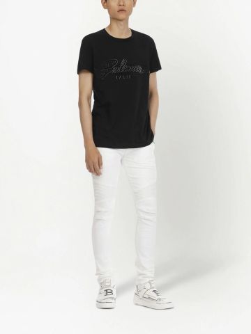 White low-waisted slim-fit jeans