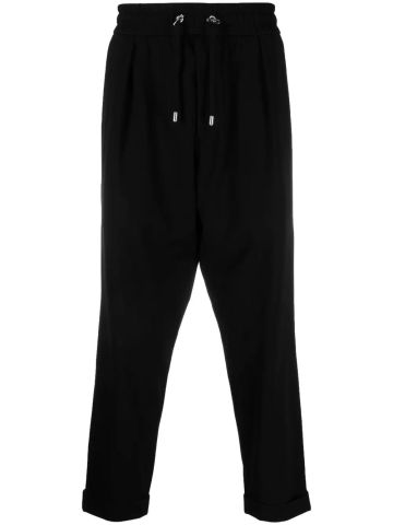 Black crop pants with low crotch and drawstring waistband