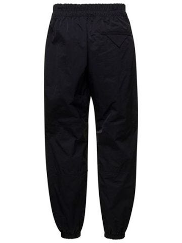 Black nylon double-zip trousers