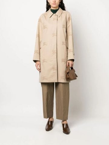 Beige trench coat with all-over logo