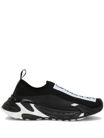 Fast black stretch jersey trainers with logo