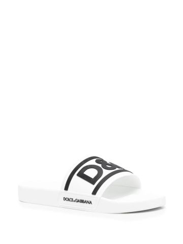 White slippers with logo print