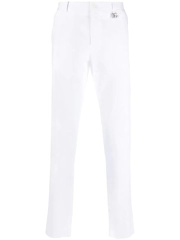 White tailored ankle-length trousers with logo