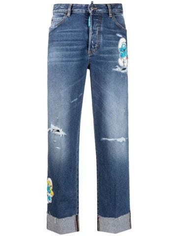 Jeans blu crop con applicazione Puffi