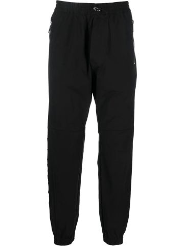 Black tapered sports trousers with logo