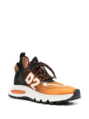 White and orange logo runner sneakers