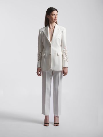 White single-breasted blazer with lace on sleeves