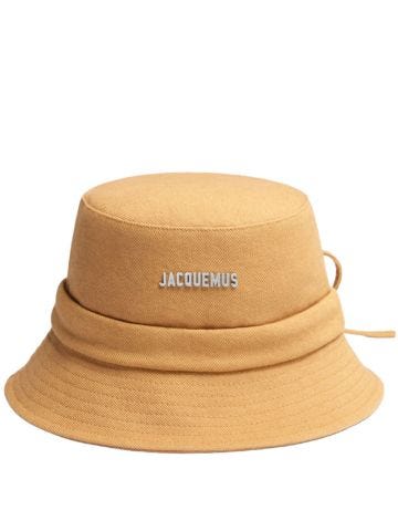 Cappello bucket beige con placca logo