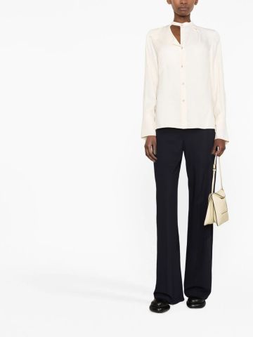 White long-sleeved shirt with asymmetrical collar