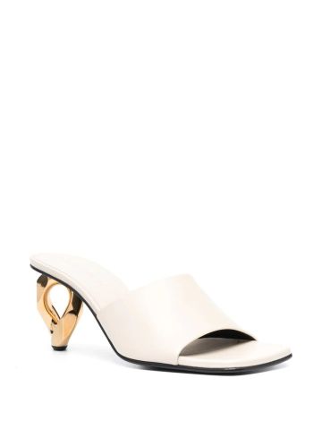 Ivory mules with gold sculpted heel