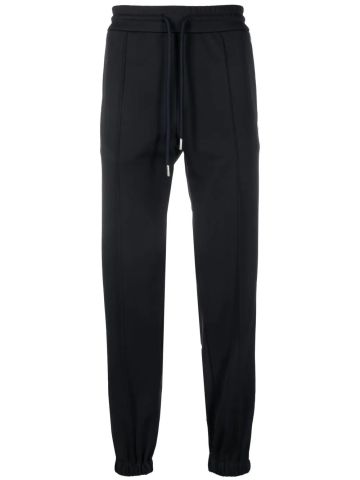 Dark blue trousers with side embroidery
