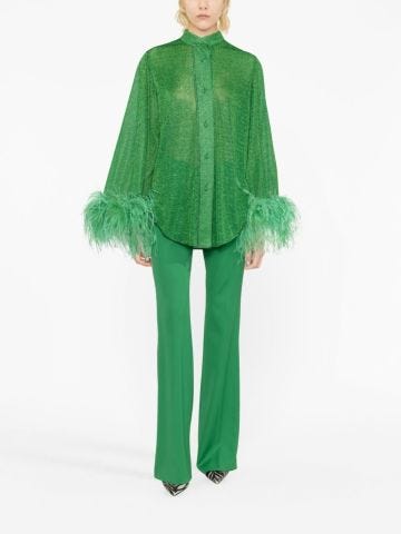 Green shirt with metallic effect and feathers