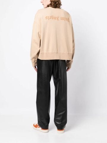 Beige round-neck sweatshirt with print