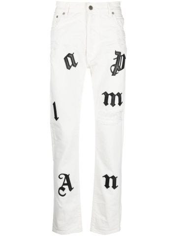 White jeans with worn effect