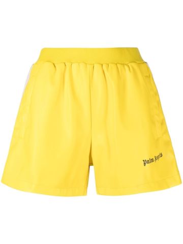 Shorts gialli con banda laterale