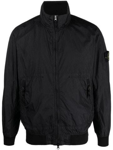 Black windbreaker jacket with Compass applique