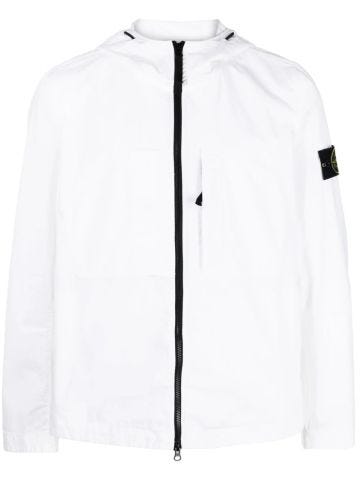 White windbreaker jacket with zipper and front pocket
