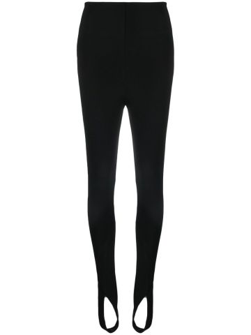 High-waisted black elastic leggings with stirrups