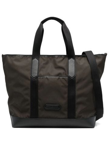 Dark green duffle bag with leather logo applique