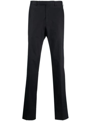 Blue tailored trousers with concealed fastening