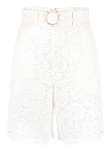 Knee-length white lace shorts