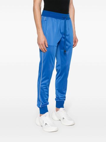 Pantaloni sportivi blu con banda laterale